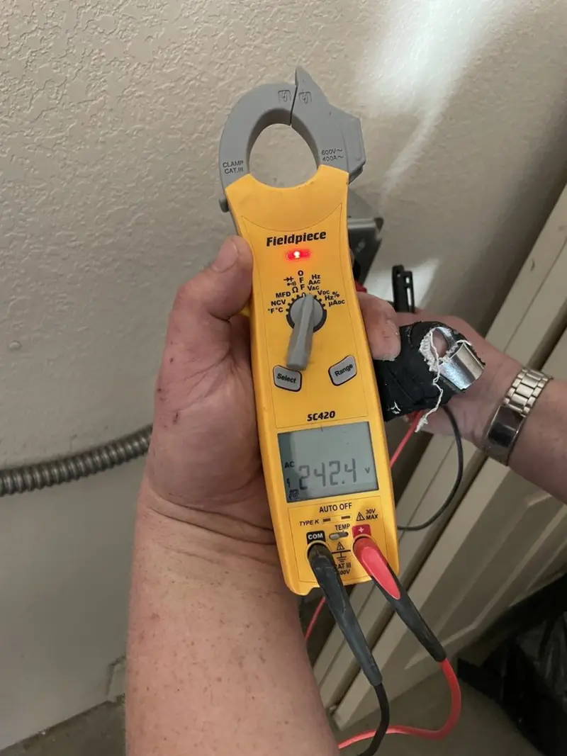 Voltage testing with clamp meter during Generator Installation in Pinole